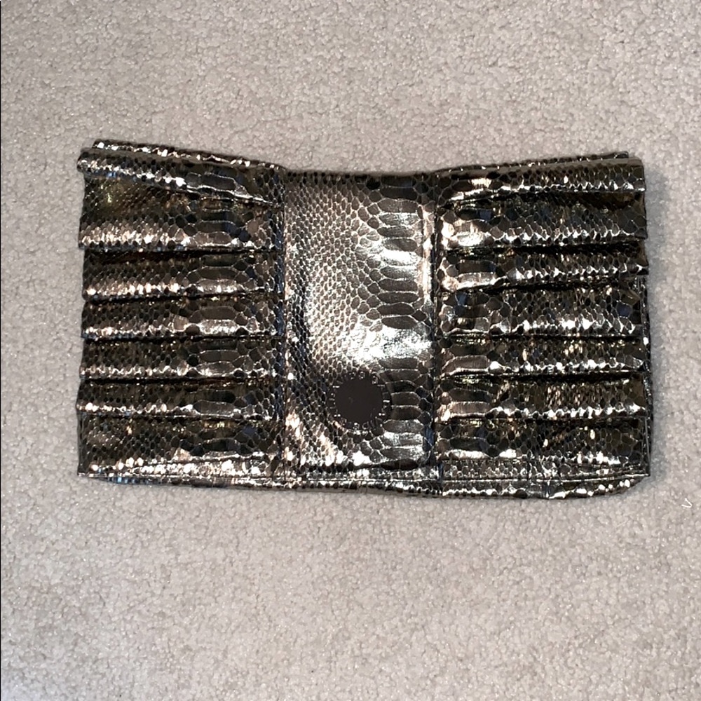 David Sigal metallic clutch purse